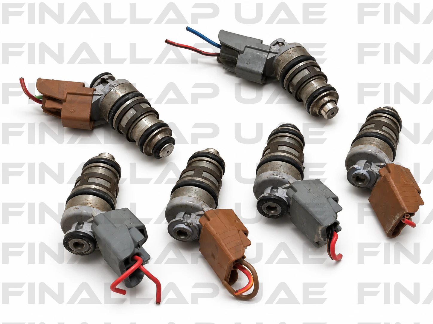 Six Used Fuel Injectors on White (2)